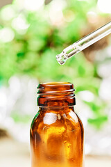 an amber colored jar ,natural product to relieve nasal congestion made with eucalyptus extract