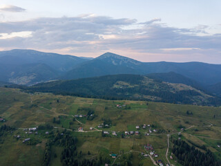 Fototapeta na wymiar Sunset over the mountains in the Ukrainian Carpathians. Evening. Aerial drone view.