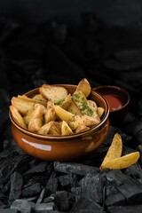 Peasant potatoes, Ukrainian food on a dark background. Food photography