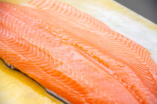 Red salmon fish. salmon fillet on the table. Healthy eating red salmon fish. Photo on fish production.