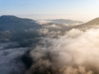 Fototapeta na wymiar Morning fog in the Ukrainian Carpathians. Aerial drone view.