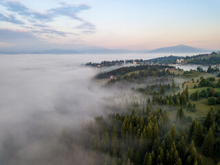 Morning fog in the Ukrainian Carpathians. Aerial drone view.