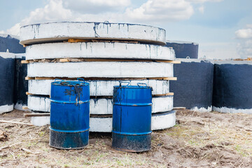 Reinforced concrete rings for the installation of underground wells at the construction site. Reinforced concrete products treated with bituminous mastic for waterproofing.