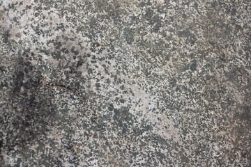 Dark old worn stone surface. Gray stone texture background.