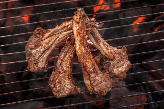 Grilled ribs on a charcoal grill. food photography