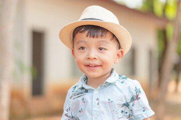 Smiling happy kid boy posing outdoor, Cheerful child playing at outdoor