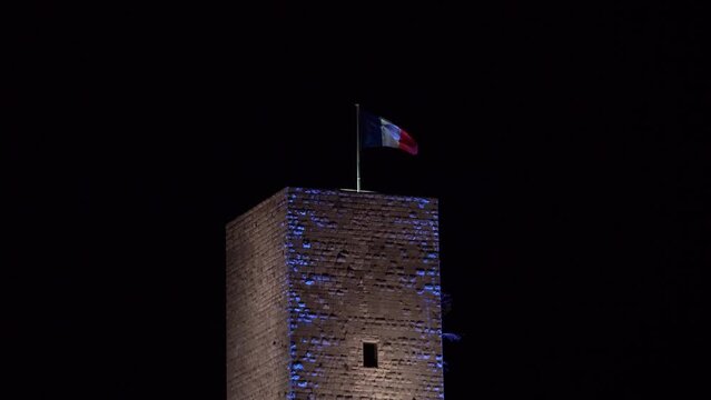 Cannes, France, Video - Closeup on the Chateau de la Castre in Cannes and its french flag at night