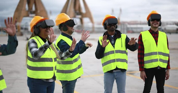 Multiracial workers using virtual reality headsets at industrial terminal Port