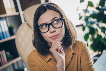 Portrait of attractive brown-haired girl leader partner top director making decision brainstorming at workplace workstation indoors