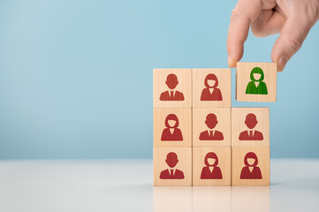 HR, Human resources and team completing. Human Resources and personnel hiring concept. Employees are represented by wooden cubes with icons. Business with Recruitment, Hiring, Team Building.