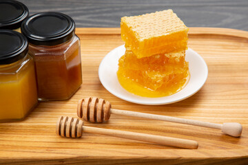 Fototapeta na wymiar Fresh flower honey and spoon. vitamin food for health and life