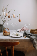 Soft focus. The table is set in Easter style.