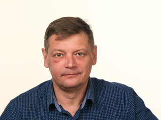 Fototapeta premium close-up portrait of a 50-year-old man with a swollen cheek and a black eye