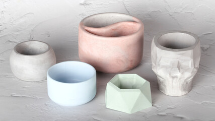 there are pots of plaster on the table. Different forms of planters. Empty plaster products.