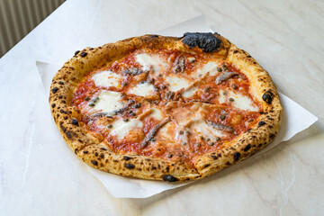 Traditional Classic Neapolitan Anchovy Pizza with Mozzarella Cheese.