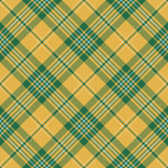 Yellow, green and blue argyle tartan plaid. Scottish pattern fabric swatch close-up. 