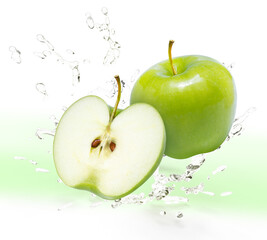 Fresh Green apple falling in the air with splash water isolated on white background, Green apple on white background With clipping path.