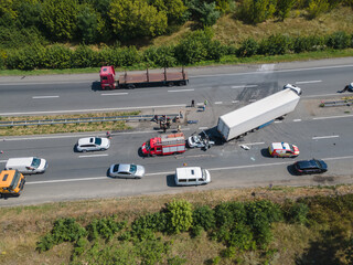 The truck and the car collided on the highway. Strong accident. Traffic accidents on the road.