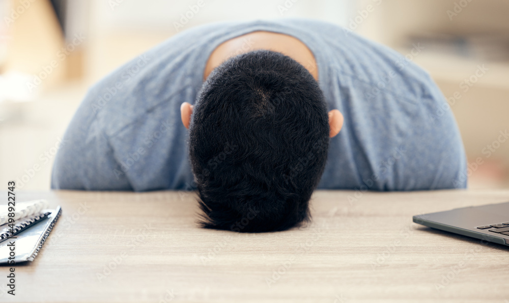 Poster putting my head down for a second. shot of an unrecognizable businessman sleeping at his desk at wor
