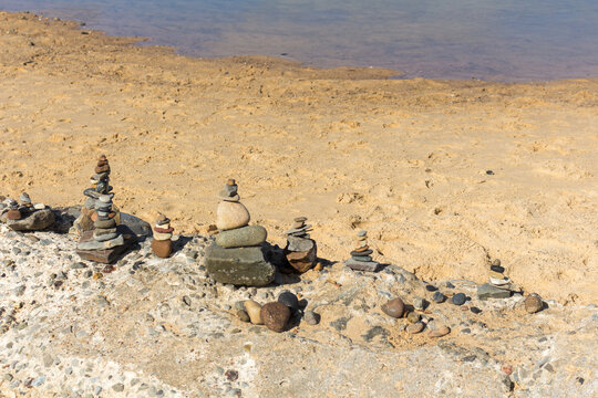 Small Stone Rock Sculptures At The Beach