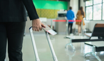 travel transport tourists on vacation.employees stand to sell tickets to tourists.students leave for the airport to wait for their flight.