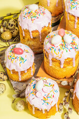 Fototapeta na wymiar Traditional Easter cake. Festive sweet food with icing and decor. Eggs, nest, willow