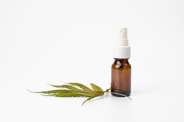 cannabis oil extract in a bottle , hemp oil marijuana leaves dry isolated on white background, herbal medicine and health care concept