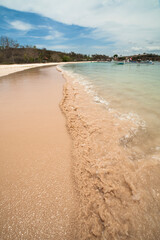 Splasing wave at pink beach Lombok Indonesia