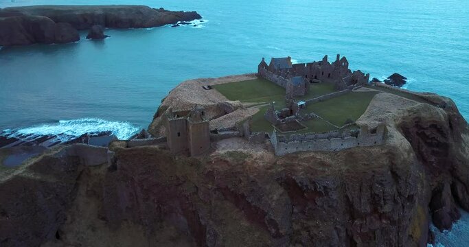 Aerial view of the ruins ancient Donator Castle in Scotland 