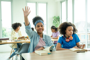 Classroom with Diverse Group of Children Learning New Stuff,African American children In Elementary School Class.