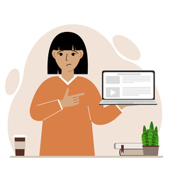 Sad woman holding a laptop computer with one hand and pointing at it with the other. Laptop computer technology concept.