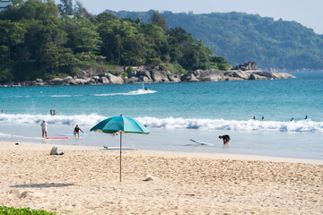 Fototapeta na wymiar Landscape clean sea Umbrella on beach mountain background.