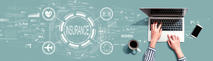 Obraz na płótnie Canvas Insurance concept with person using a laptop computer