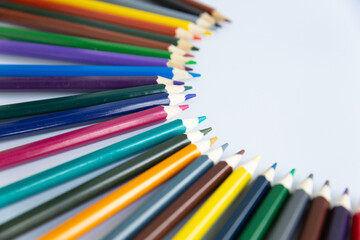 Set of colored watercolor pencils isolated on a white background