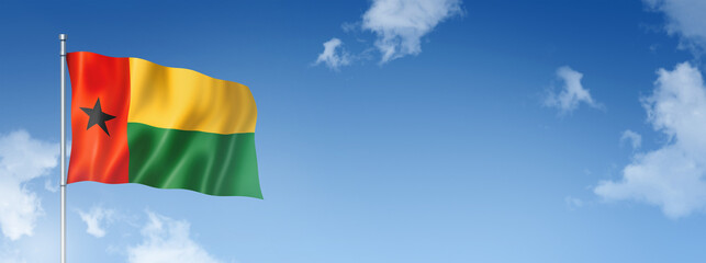 Guinea Bissau flag isolated on a blue sky. Horizontal banner