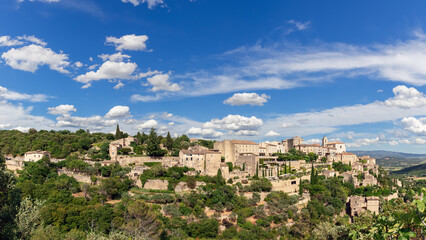 Fototapeta na wymiar Super panoramic view Luberon valley with ancient Gordes town. Vaucluse, Provence, Alpes, Cote d'Azur, France