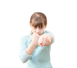 little girl wearing casual   t shirt angry and mad raising fist frustrated and furious while...
