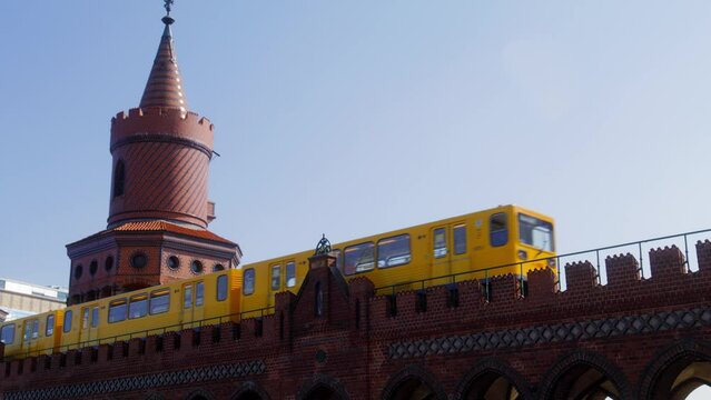 metro going ober Oberbaumbridge, berlin, germany