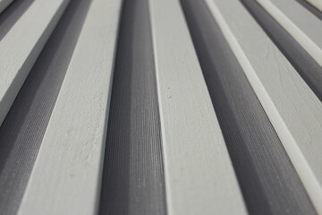 white wooden sticks on a gray background
