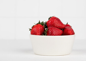 Red strawberries in a bowl