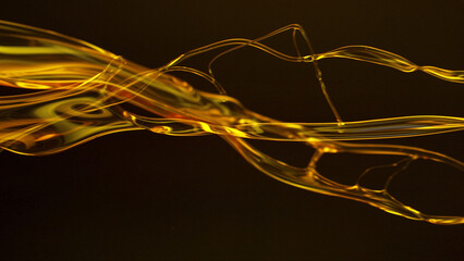 Freeze Motion Shot of Flowing Oil on Gradient Black Background