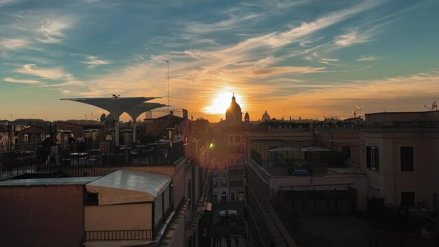 Aerial wide shot over city of Rome with silhouette of famous Saint Peters Basilica in Italy,Vatican