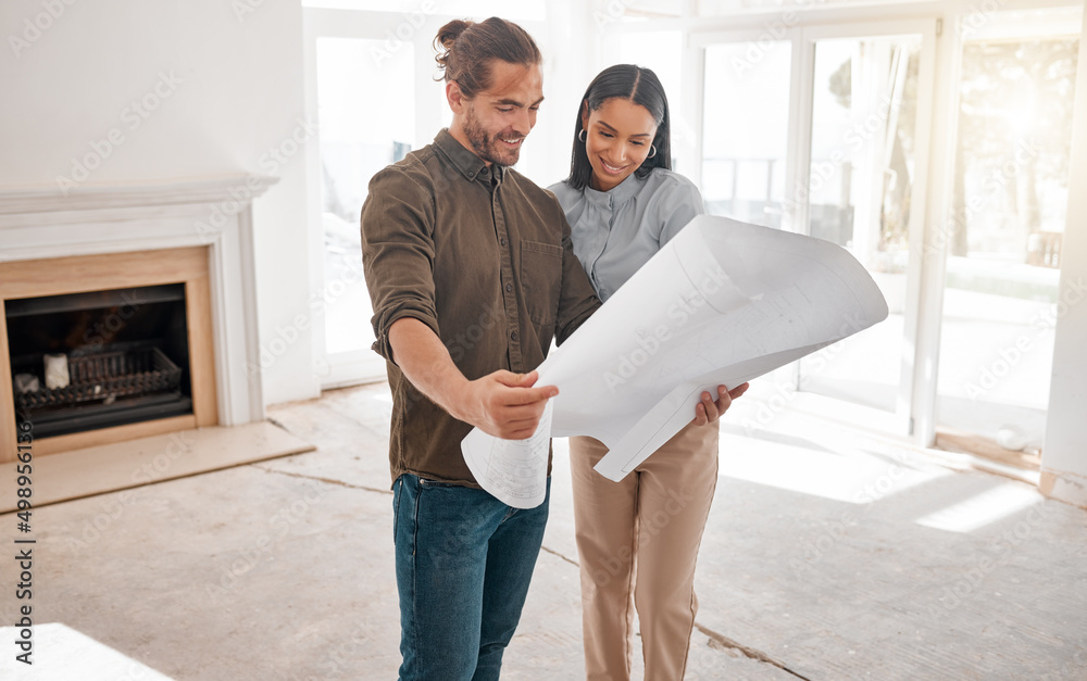 Poster are you happy with the final plan. shot of two young architects looking at building plans on site.