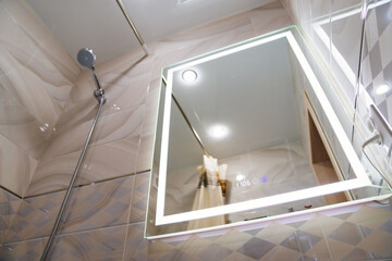 the modern electronic bathroom mirror. accessories and furniture for bathrooms.