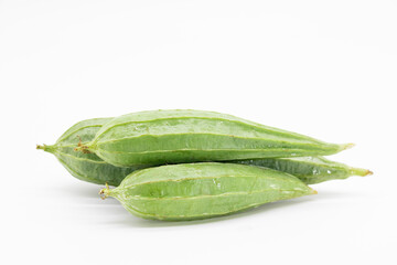 Fresh Angled loofah fruit isolated on white background