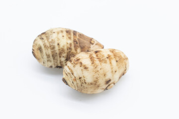 Taro root on white background.