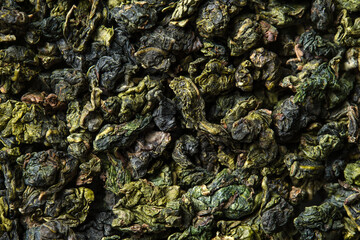Fototapeta na wymiar Oolong tea on white background. Top view. Close up. High resolution