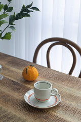 Empty coffee cup on vintage wooden table