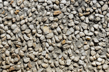 Small rocks construction background. Crushed stones texture of buildings and roads for landscaping top view. High quality photo