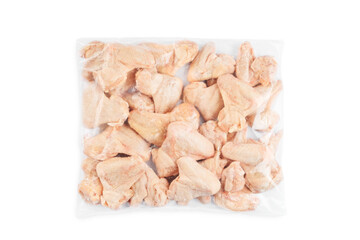 Industrial chicken selling and producing.Raw, frozen Chicken wings in a transparent package on an isolated white background.Top view.Copy space.